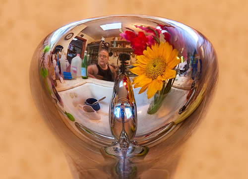 Self-portrait in faucet by Harold Davis