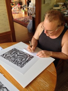Harold signing prints